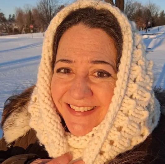 Copywriter Dina Gio, with knitted cowl